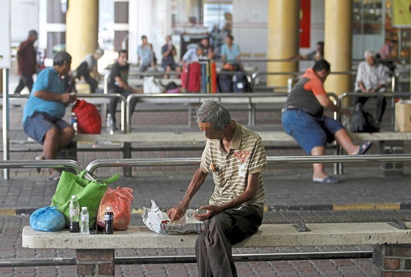 (BRIEF CAPTION) Homeless people at the Komtar bus terminal duirng the third day of the Movement Control Order (MCO) in George Town,Penang. Pic by: ZHAFARAN NASIB/The Star/ 20 March 2020