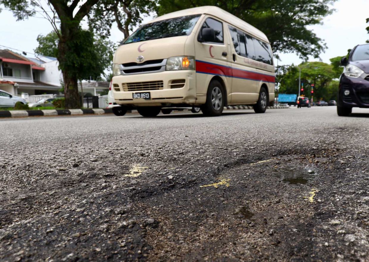 Potholes at several areas that have been neglected around Klang city. — FAIHAN GHANI/The Star