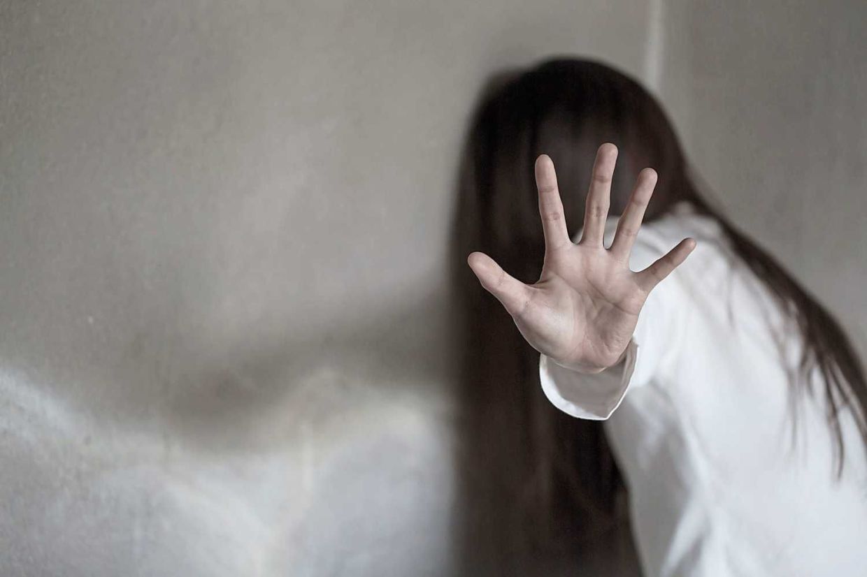 Woman bondage in angle of abandoned building, stop violence against Women, international women's day