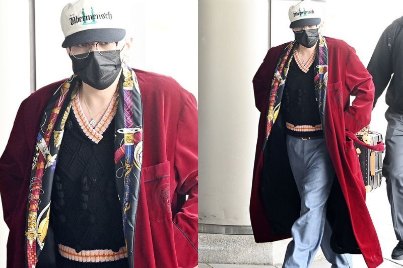G-Dragon dilihat tampil dengan fesyen jubah mandi ketika di Lapangan Terbang Antarabangsa Gimpo, Seoul.
