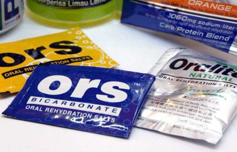 Sports drinks can replace the electrolytes lost when you sweat. Oral dehydration salts (foreground) mixed with water are a cheaper option but they don't contain Carbohydrate*** Local Caption *** Pix without caption