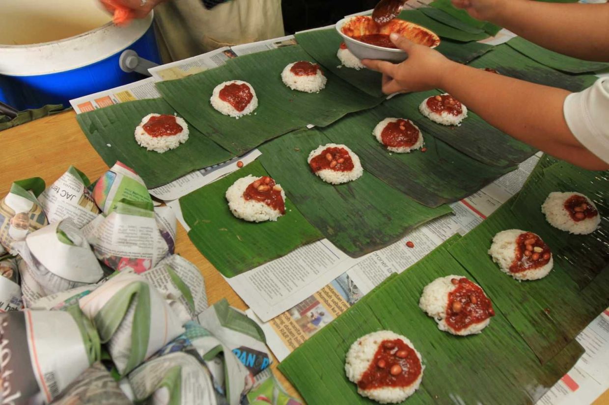 Warong Kaklong, wrapped nasi lemak 50 sen.Starpix by Low Lay Phon.