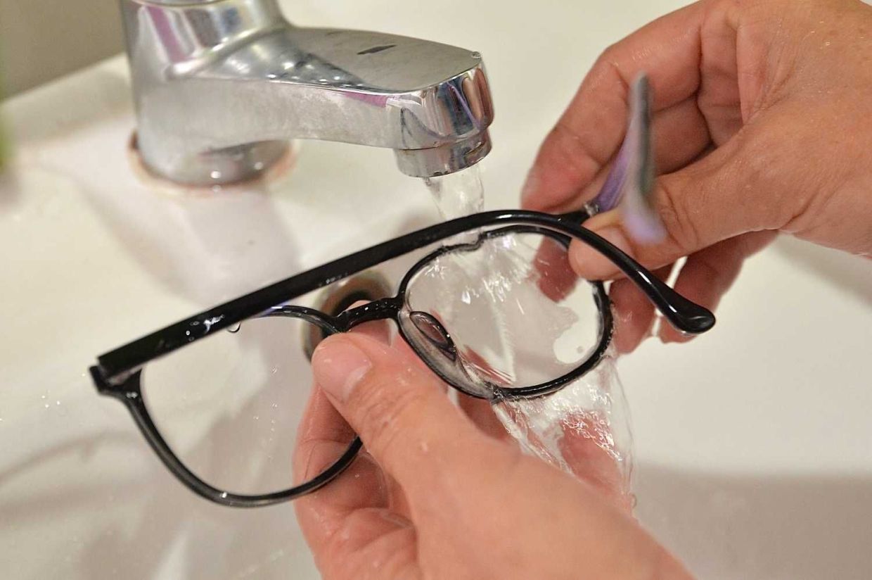 Washing spectacles with soap is recommended to prevent the spread of COVID-19.—ONG SOON HIN/The StarReporter:nil