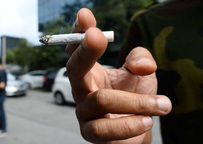A group of peoples smoking at a public area near a bus stop at Damansara .AZHAR MAHFOF/The Star (29/10/2019)