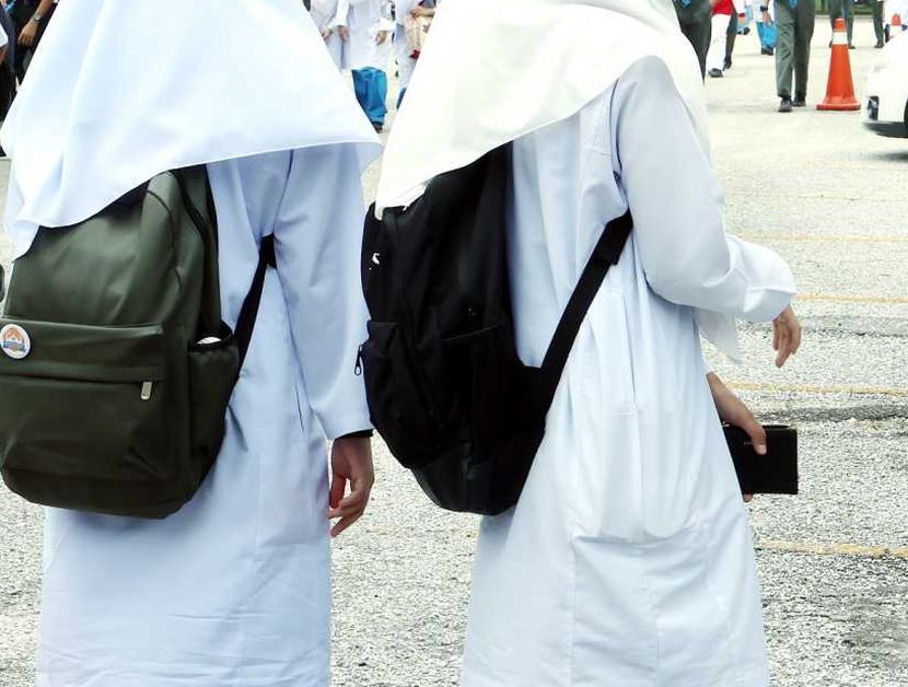 SMK Sultan Salahuddin Abdul Aziz Shah SPM students leaving school in Shah Alam. We need the students as from the back where they are going out from school— KK SHAM/The Star