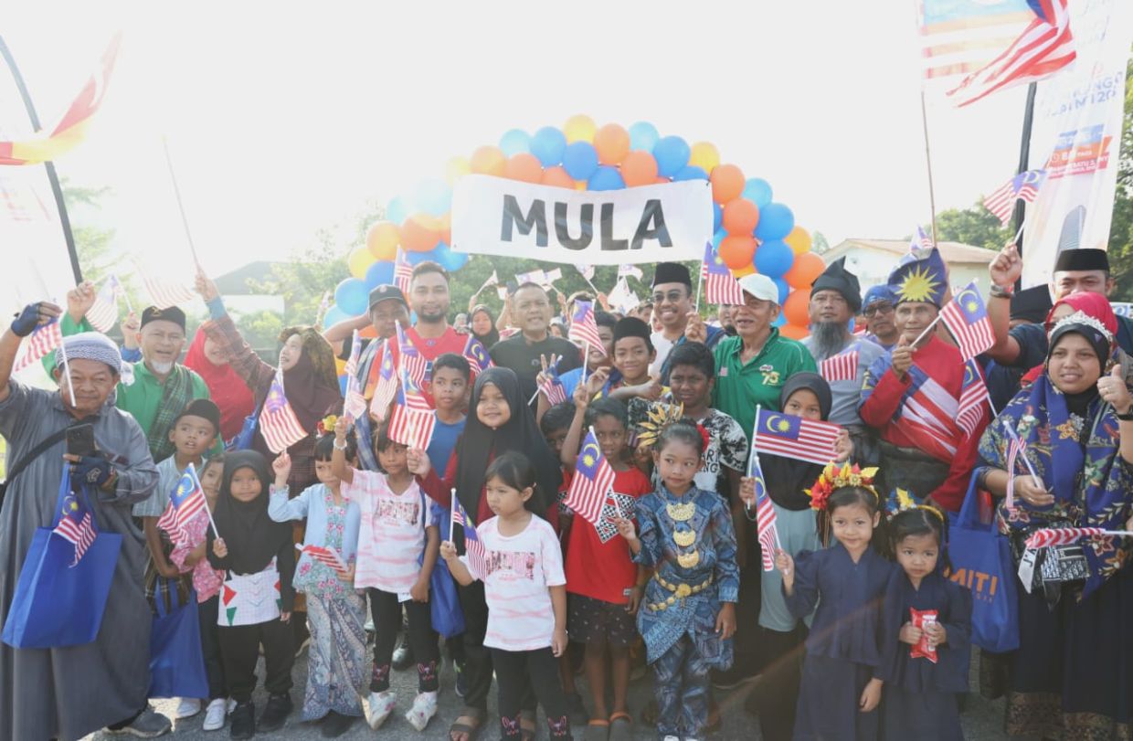 Program Merdeka@Kampung Angkat Madani 2025 berlangsung dengan penuh semangat kemerdekaan dan perpaduan.