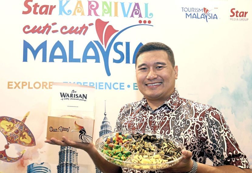 Kek Lapis Warisan Sdn Bhd managing director Dr Mohamad Hafeezi Datuk Haji Abdullah said the Cuti-Cuti Malaysia Carnival, co-organised by Star Media Group Berhad and Tourism Malaysia, is a good opportunity for him to expand his Sarawak layered cake business into the Peninsular. — AZLINA ABDULLAH/The Star