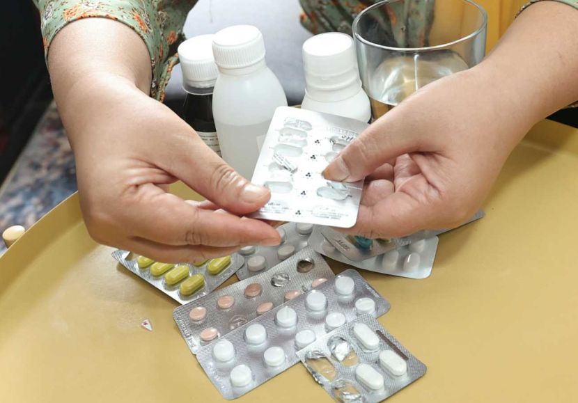 Pics pose for story on people taking their expired medicine.—AZMAN GHANI/The Star