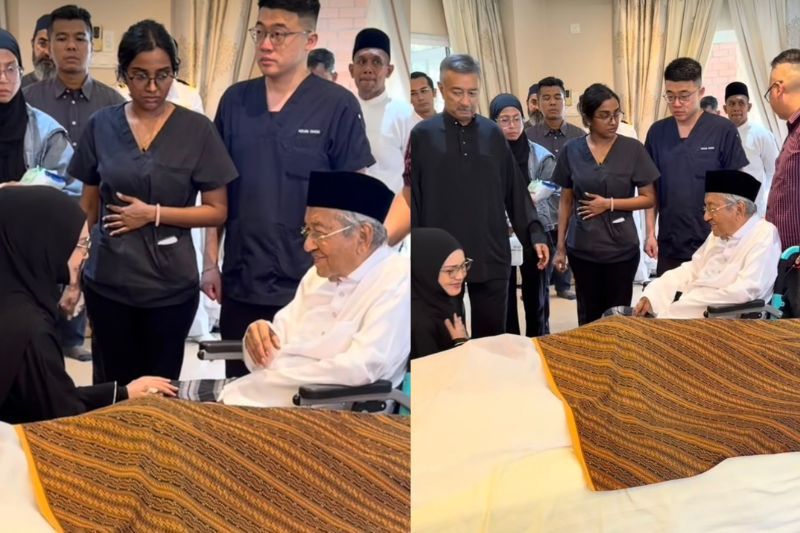 Siti (kiri) sempat menyapa Tun Mahathir ketika berkunjung di kediamannya.