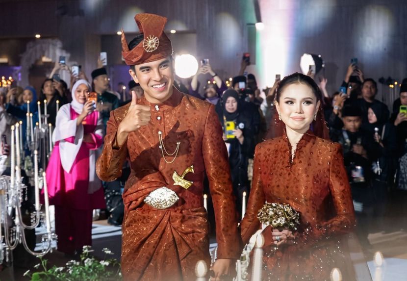 Syed Saddiq dan Bella manis dalam busana tradisional.